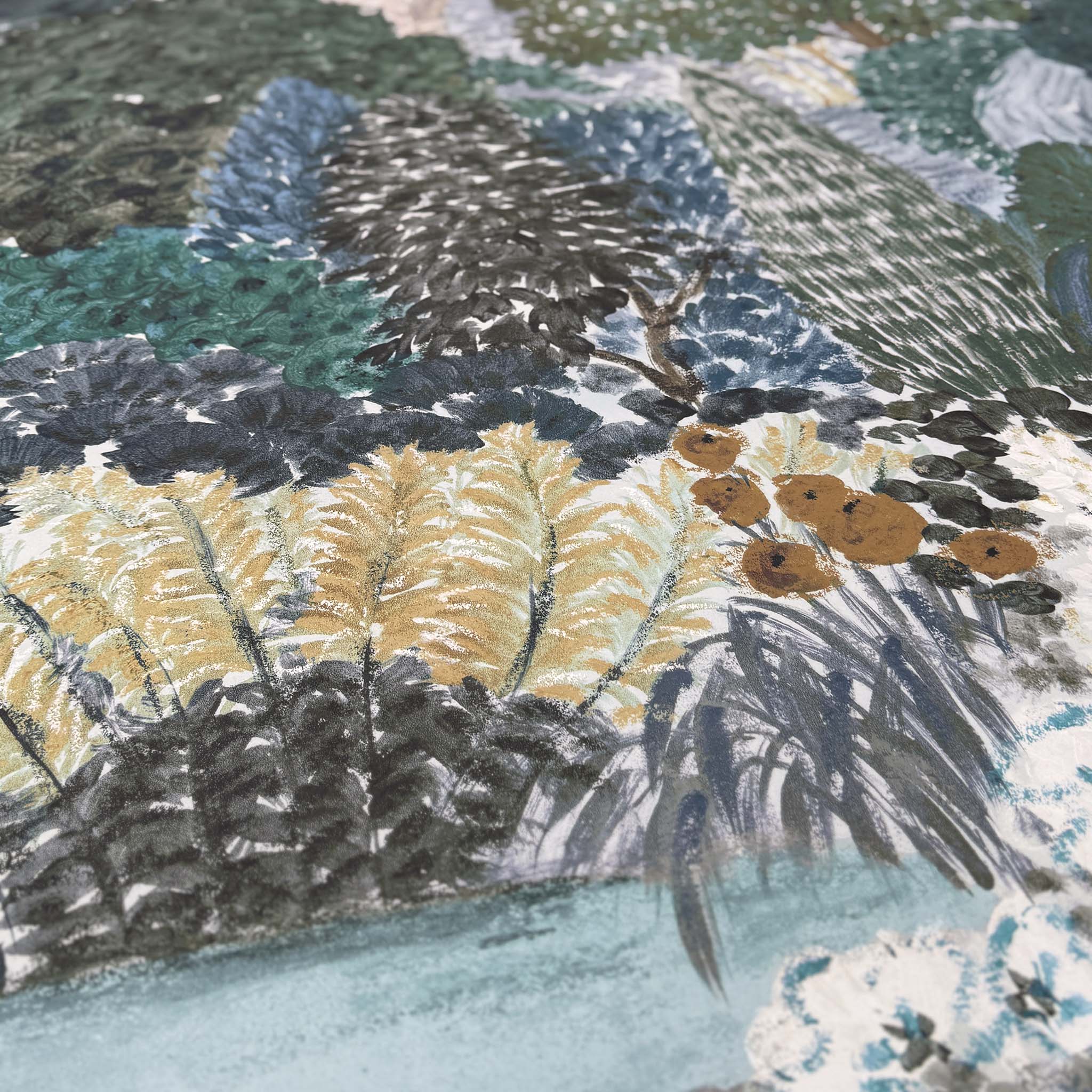 A close up view showing the detail of a matte wallpaper mural which features teal, sea green, and slate countryside scene