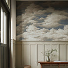 An interiorhallway featuring a panoramic matte wallpaper mural of dramatic cream clouds