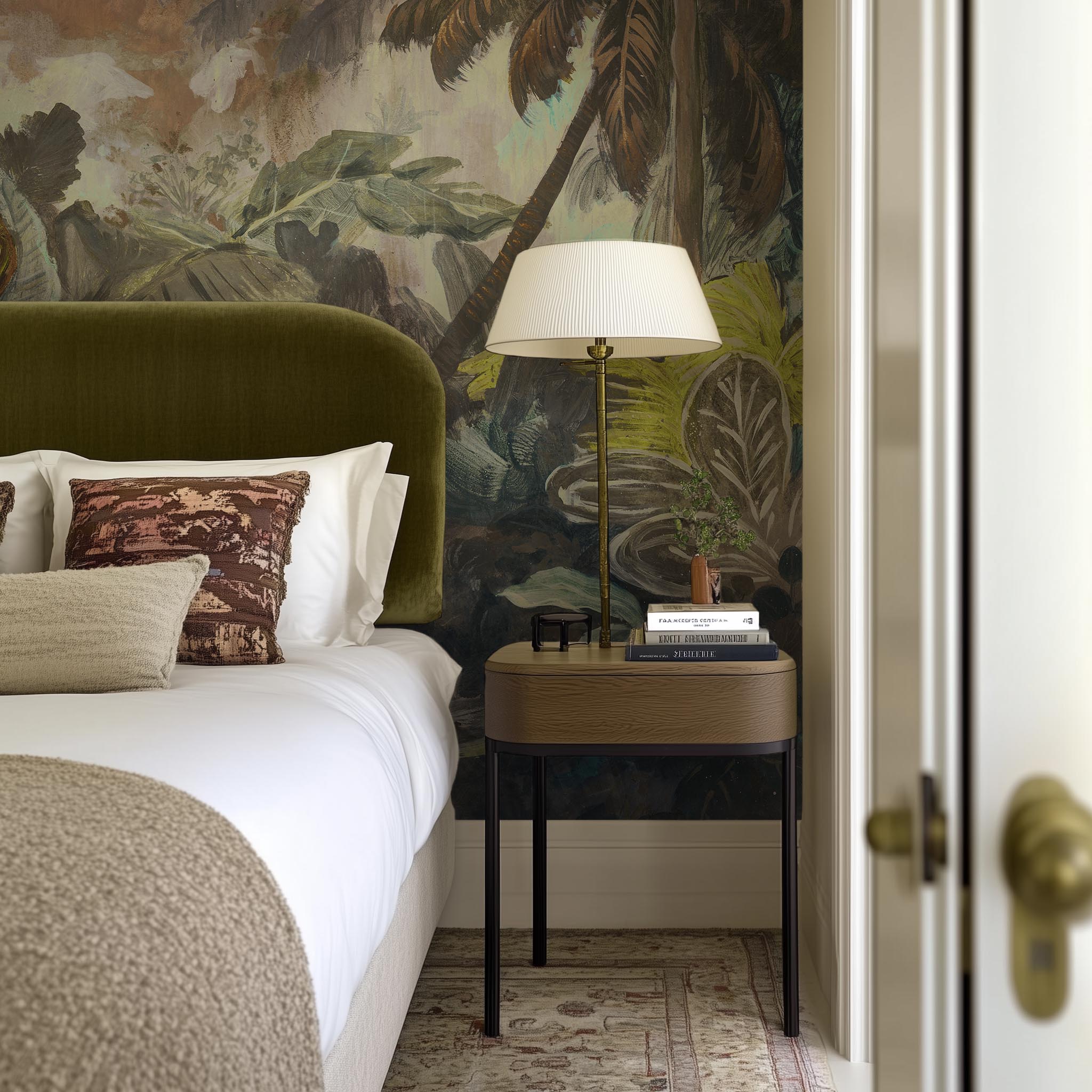 A cropped view of bedroom featuring a panoramic matte wallpaper mural of a moody jungle in teal and ochre.