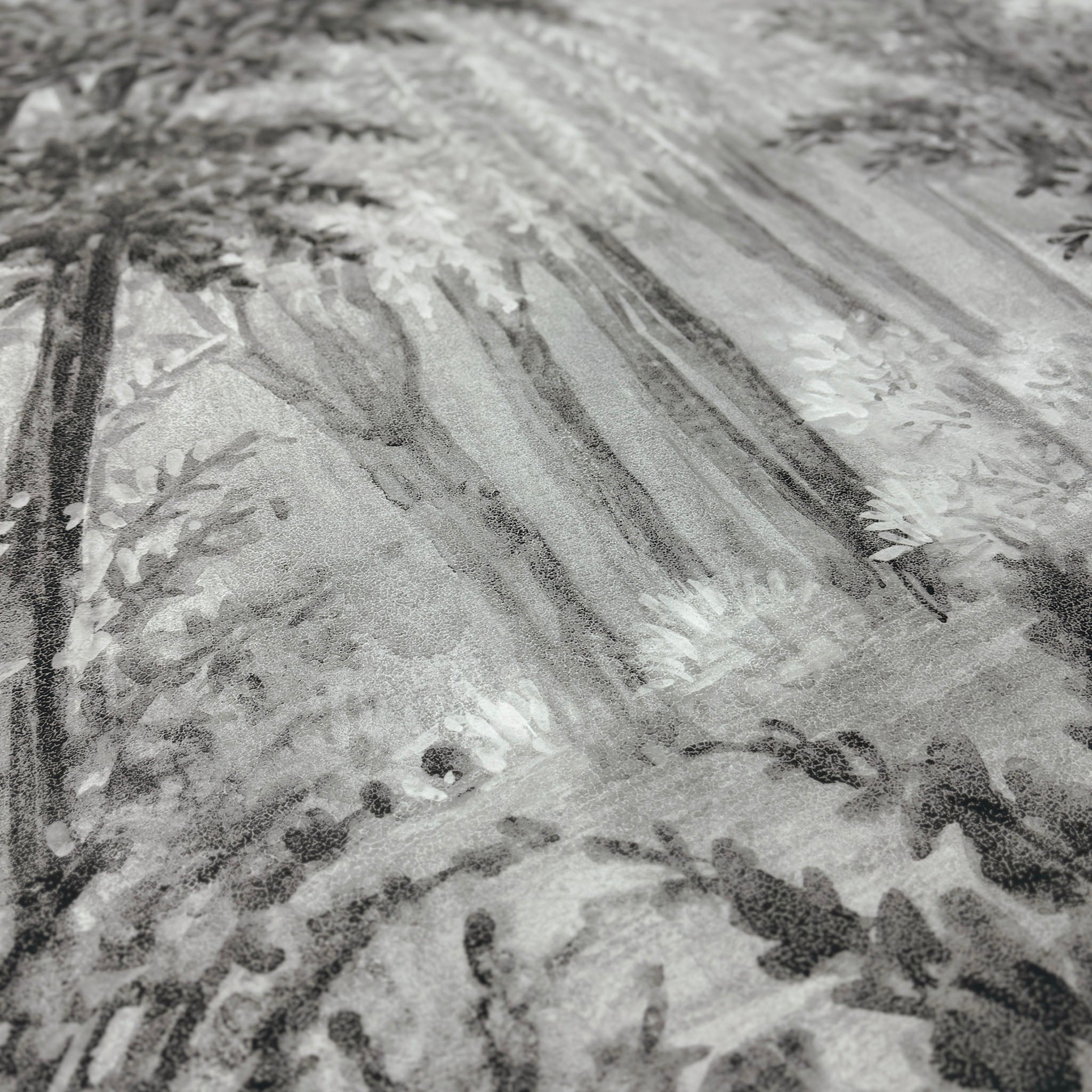 A close up view showing the detail of a matte wallpaper mural which features ash grey forest
