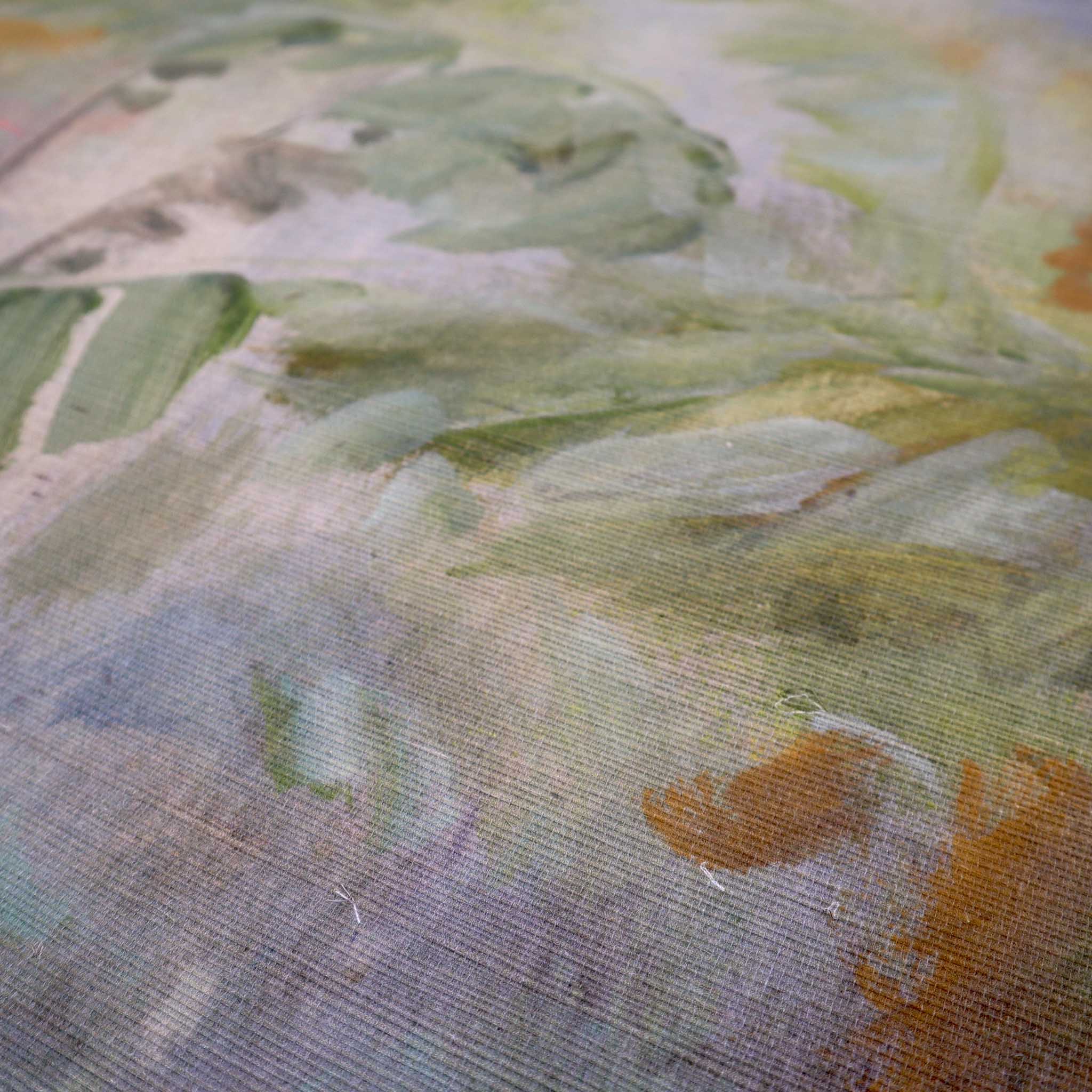 Close-up of bespoke tropical mural on grasscloth, featuring soft greens, warm golds, and gentle natural texture.