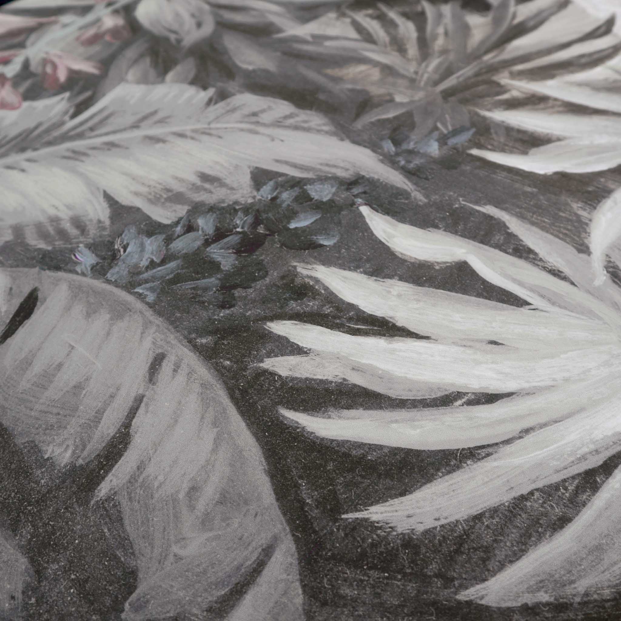 Close-up of a hand-painted, tropical-themed wallpaper mural featuring soft foliage in gentle ecru and grey tones.