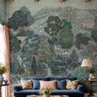 A cropped view of a living room featuring a panoramic grasscloth wallpaper mural of ash grey forest