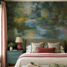 A cropped view of a bedroom featuring a panoramic pearlescent wallpaper mural of moody mural in nettle green, teal, ochre foliage.