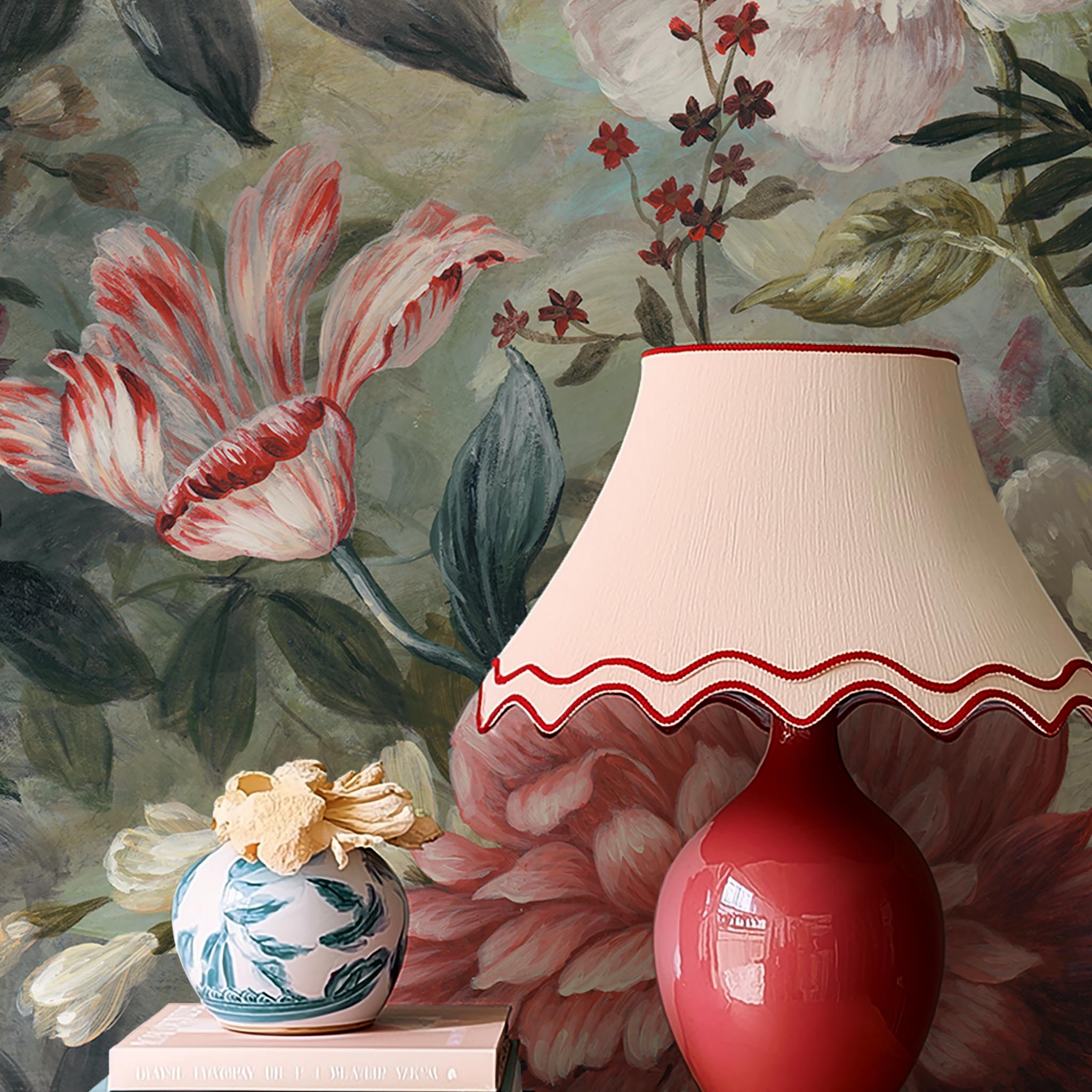 A cropped view of hallway featuring a panoramic matte wallpaper mural of a floral tapestry in rich jewel tones.