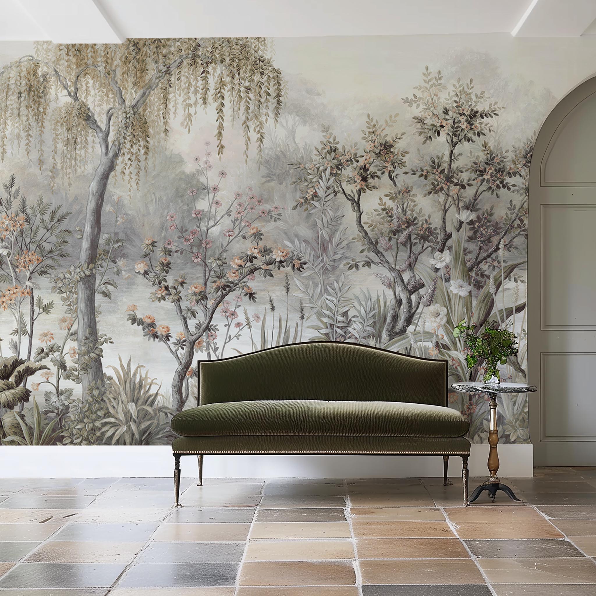 An interior sitting area featuring a panoramic vinyl wallpaper mural of a lakeside scene in grey and peach.