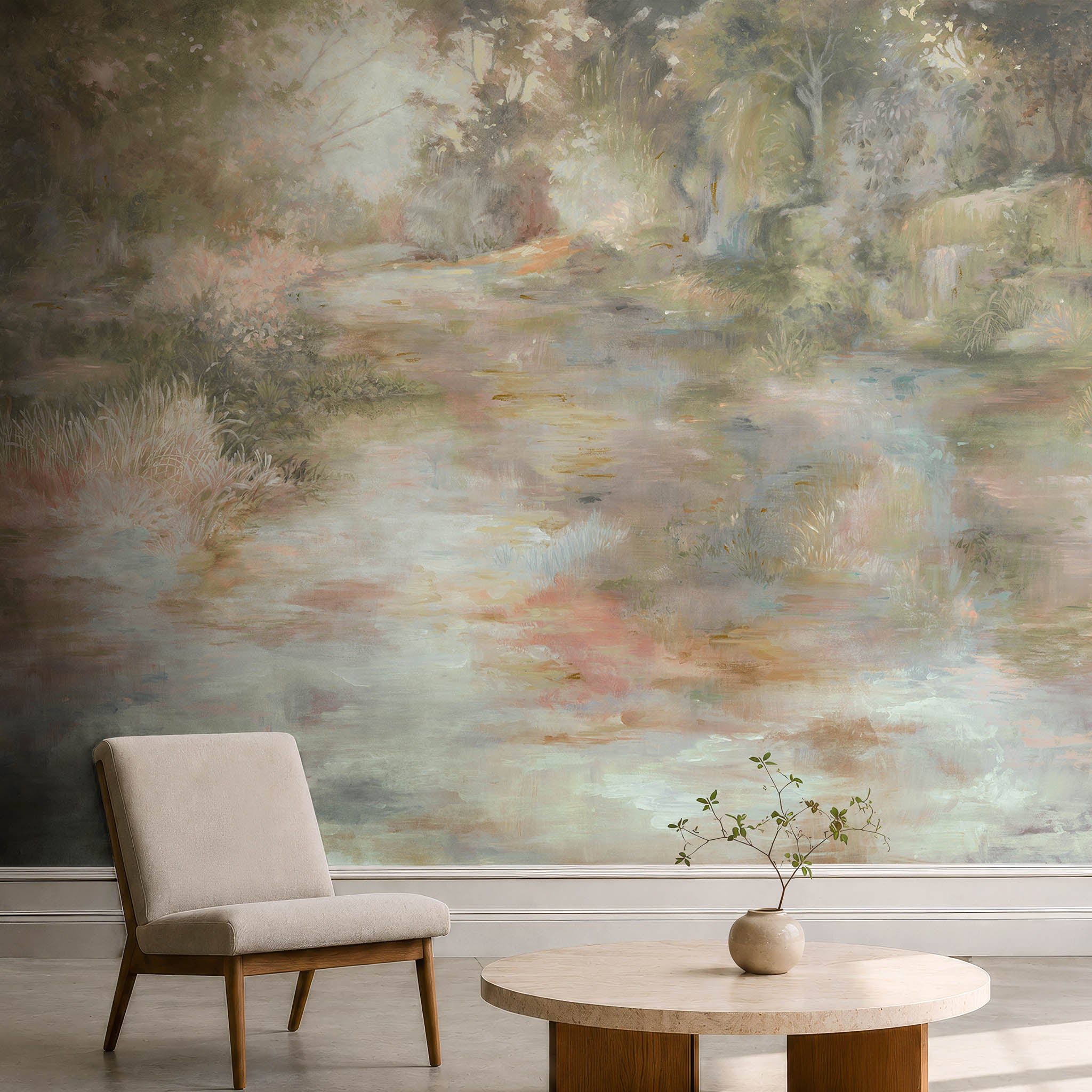 A cropped view of a sitting area featuring a panoramic pearlescent wallpaper mural of soft mural in chicory blue, dusty rose, sage and ochre.