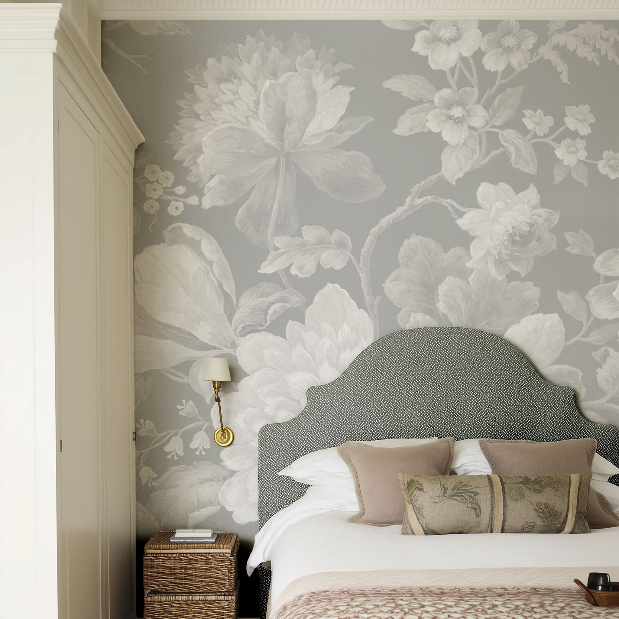 An interiorbedroom featuring a panoramic matte wallpaper mural of misty whites on dove grey floral