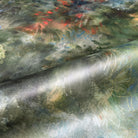 A close up view showing the detail of a pearlescent wallpaper mural which features moody nettle-green mural with sage, charcoal and rust colours.