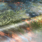 A close up view showing the detail of a pearlescent wallpaper mural which features moody mural in nettle green, teal, ochre foliage.