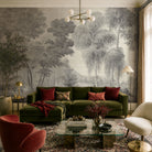 An interior living room featuring a panoramic grasscloth wallpaper mural of ash grey forest